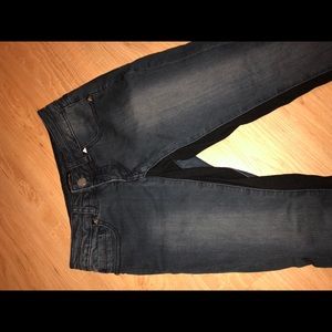 Studded skinny jeans with inner thigh detail